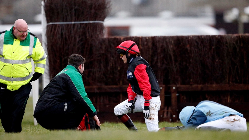 Victoria Pendleton (L) after becoming unseated riding Pacha Du Polder at Fakenham last month