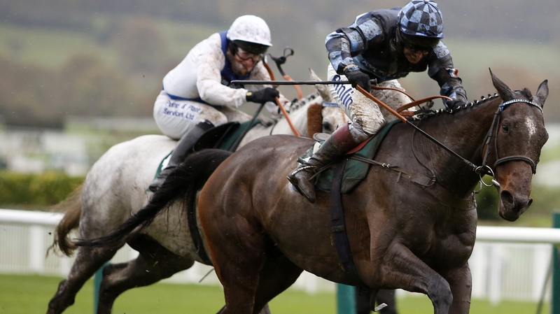 Sausalito Sunrise and Richard Johnson (nearest) winning the Murphy Group Chase at Cheltenham