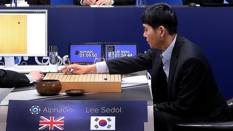 Lee Se-Dol plays his first stone against Google's artificial intelligence program, AlphaGo