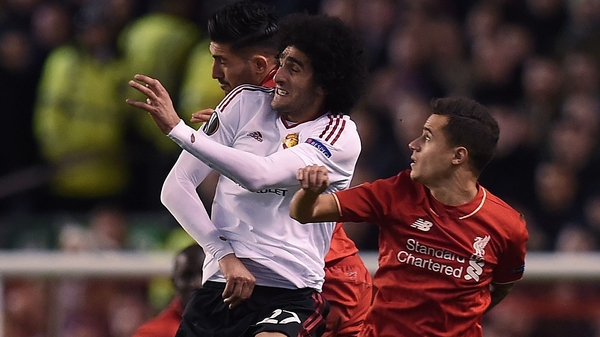 Emer Can and Marouane Fellaini had a running battle at Anfield