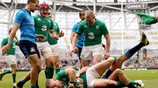 Ian Madigan gets over for Ireland