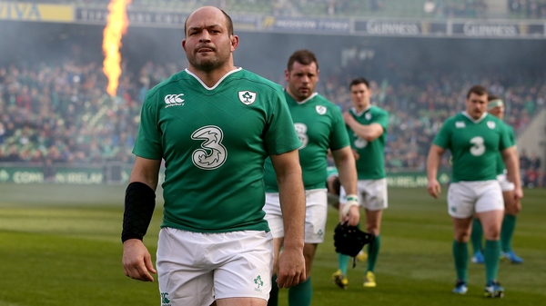 Best leads his team on to the field for what turned out to be an easy win against Italy