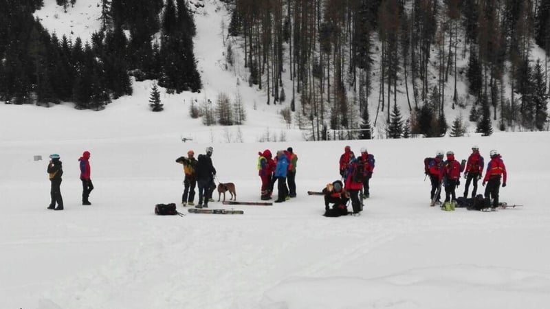 Rescuers arrive at the site 
of where the avalanche came down in the Ahrn valley (Ahrntal) in South Tyrol, Italy
