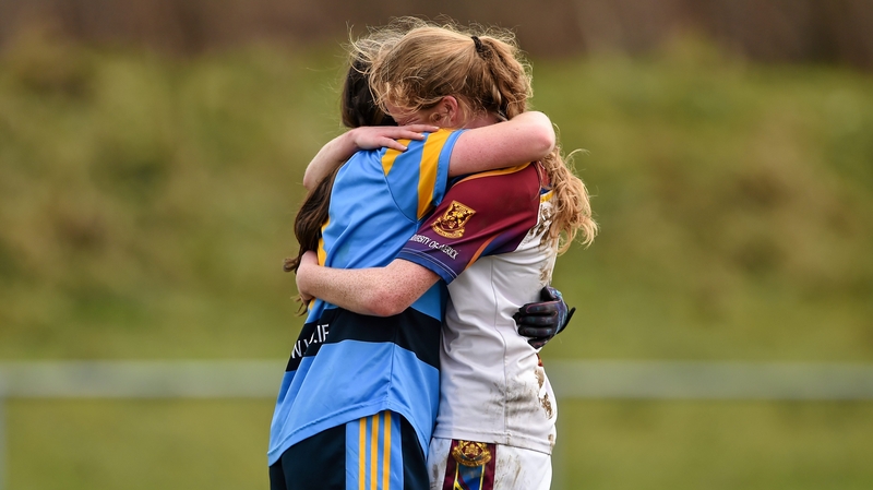 Nicola Ward (left) hugs her twin sister Louise after the O'Connor Cup final