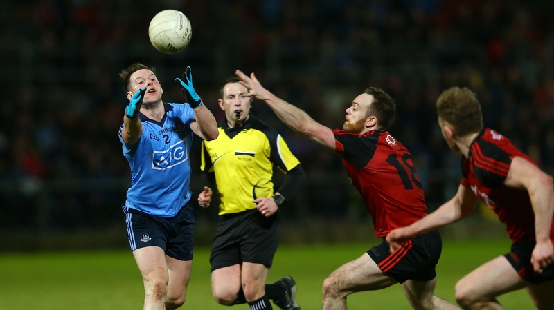 Down's Ryan Mallon with Dublin's Philly McMahon