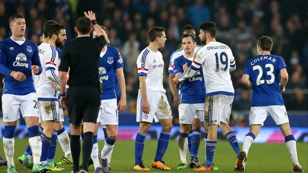 Diego Costa (2nd R) of Chelsea reacts prior to being shown the red card