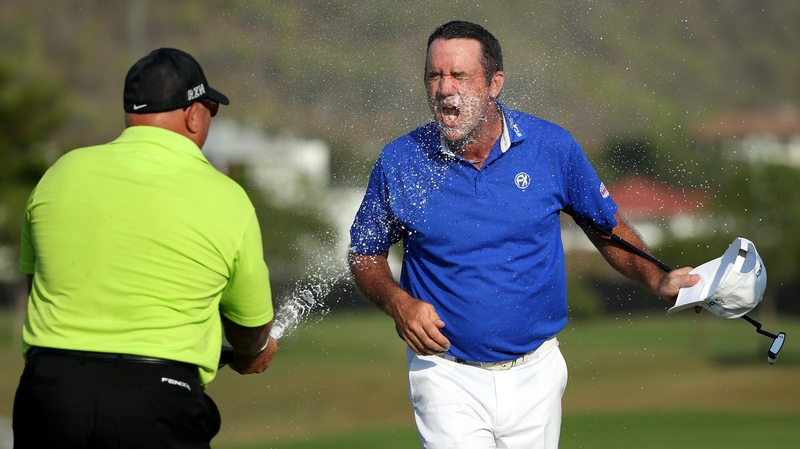Scott Hend is sprayed with champagne after winning in Thailand