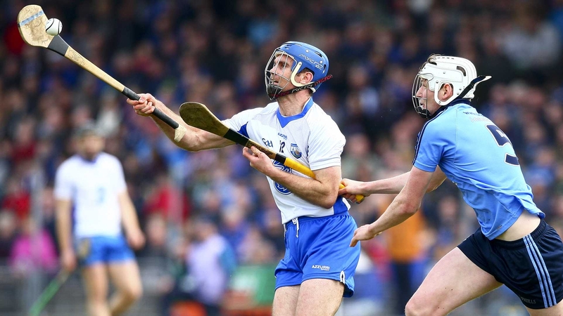 Michael Walsh gets there in front of Dublin's Shane Barrett