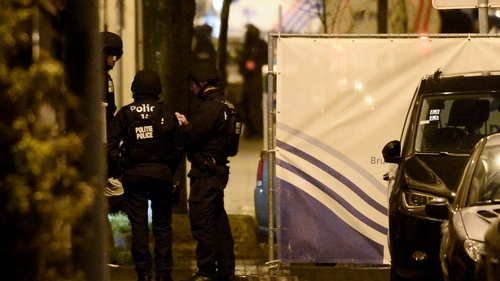 Belgian police officers at the scene of the incident