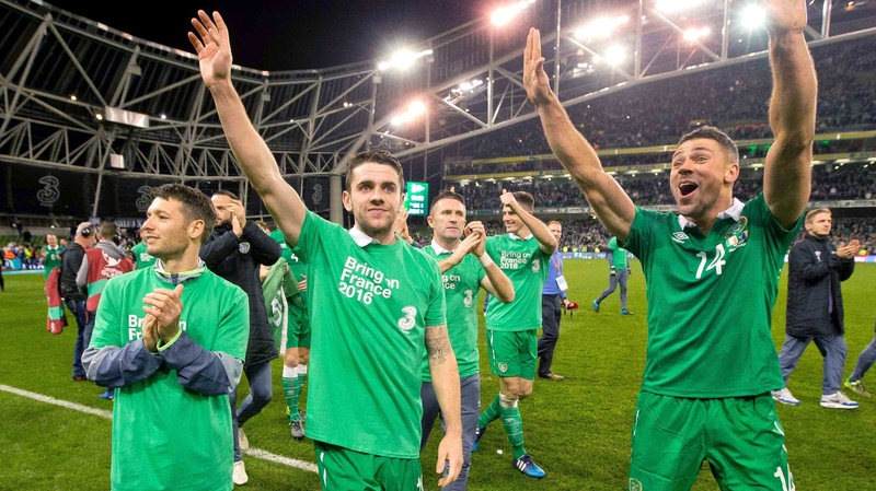Wes Hoolahan, Robbie Brady and Jonathan Walters celebrate after Ireland's qualification for Euro 2016