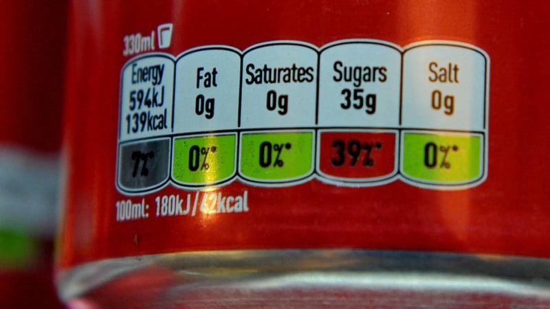 Cans of Coca-Cola which would currently fall within the higher rate of the sugar tax under the new proposals