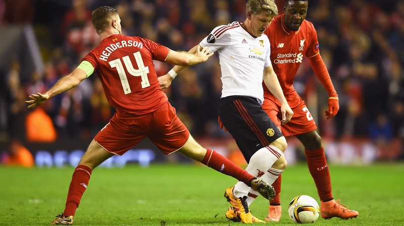 The Liverpool skipper tackles United's Bastian Schweinsteiger at Anfield during the first leg