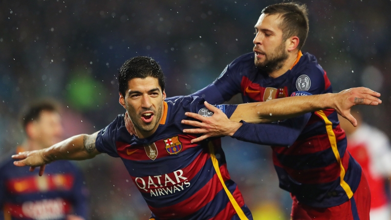 Luis Suarez (L) celebrates scoring Barcelona's second goal against with team-mate Jordi Alba