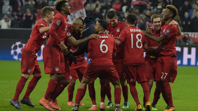 Bayern Munich players celebrate at the final whistle