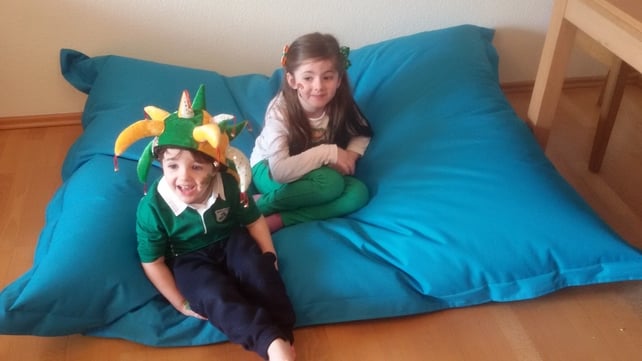 Liam and Kiera Fleck in Vienna are glued to the parade coverage on RTÉ (Pic: Nicola Kehoe)