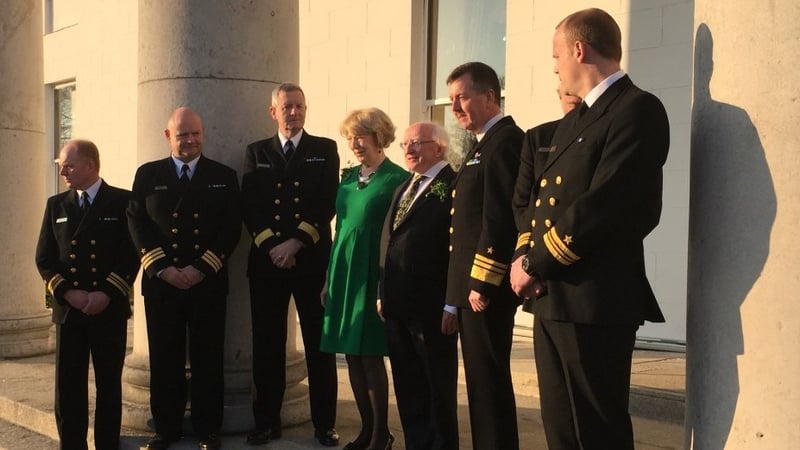 President Michael D Higgins and his wife Sabina with members of the Irish Navy outside Áras an Uachtaráin