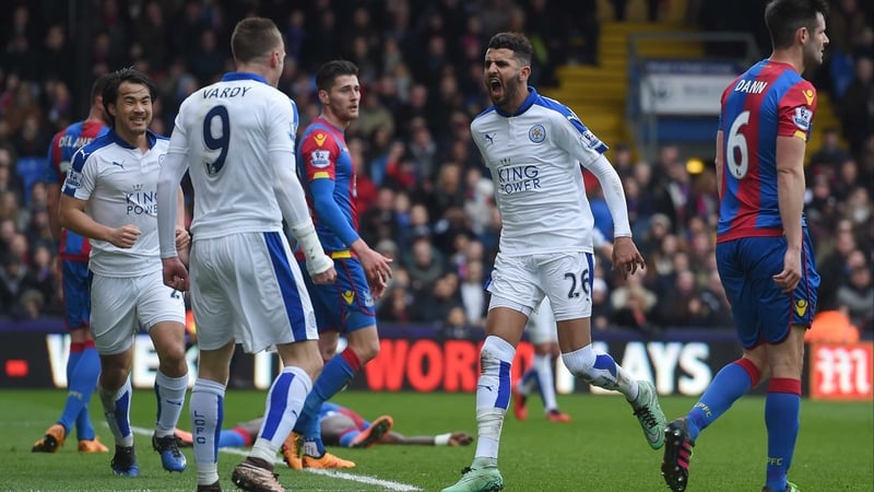 Riyad Mahrez heads towards Jamie Vardy after scoring for Leicester