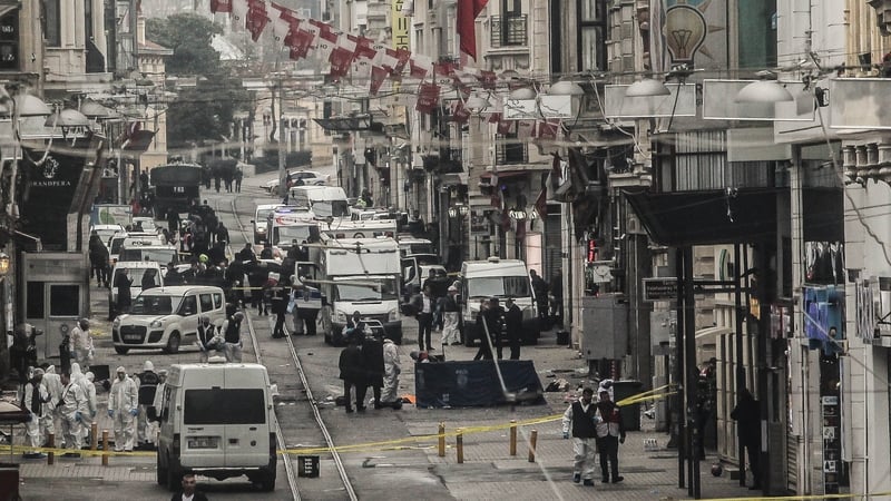 Emergency services inspecting the area following an attack in a major shopping district in Istanbul, Turkey