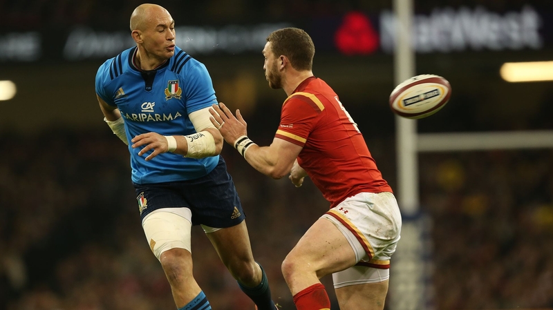 Italy's Sergio Parisse (L) in action against Wales