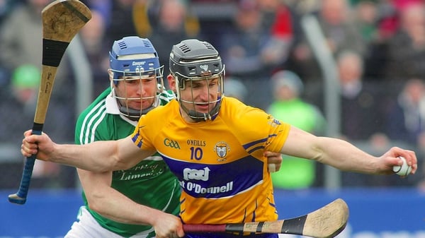 Clare's John Conlon evades Richie McCarthy of Limerick