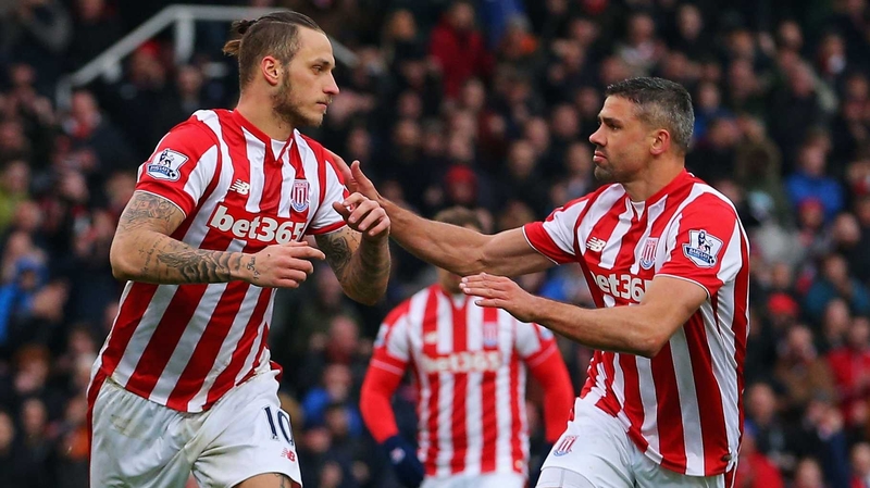 Jonathan Walters (R) celebrates with Marko Arnautovic