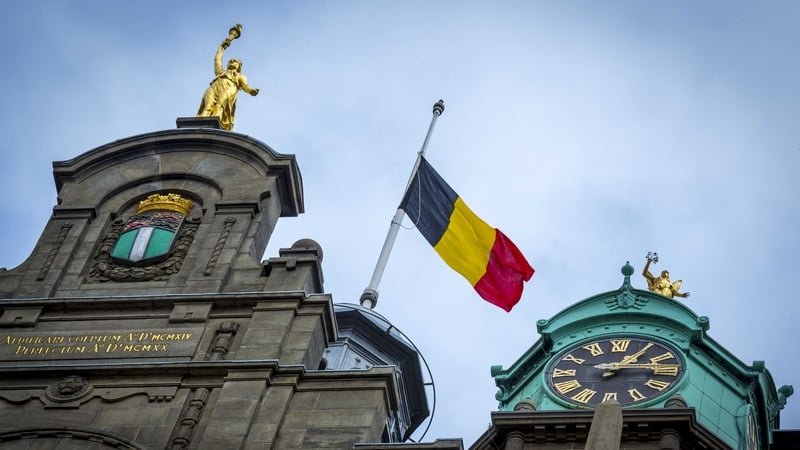 The Belgian flag flys at half-mast at the city hall in Rotterdam