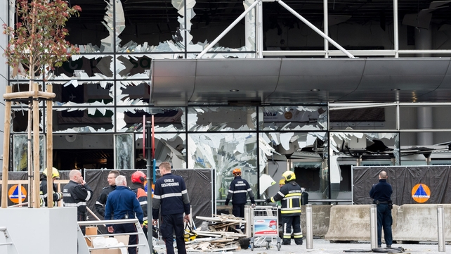 Emergency crews survey the damage to Zaventem Airport