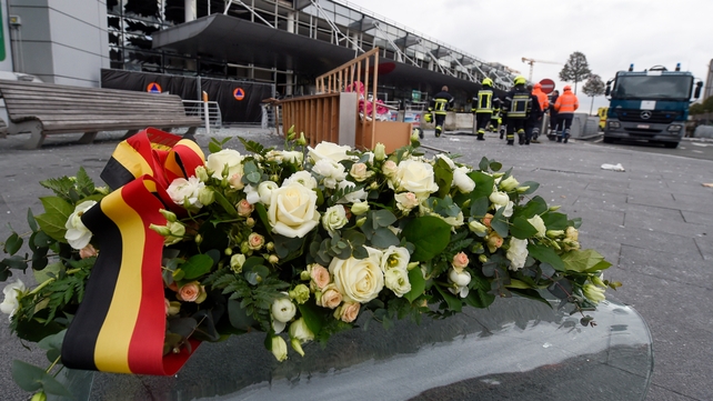 A wreath layed for the attacks victims in front of the damaged departure hall at Brussels Airport