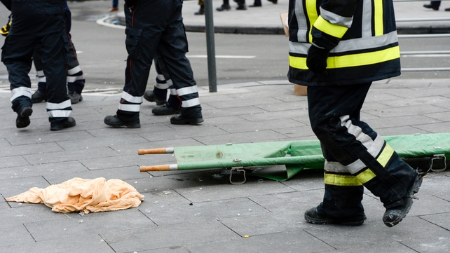 Debris is seen outside the departure hall in the aftermath of the bombing