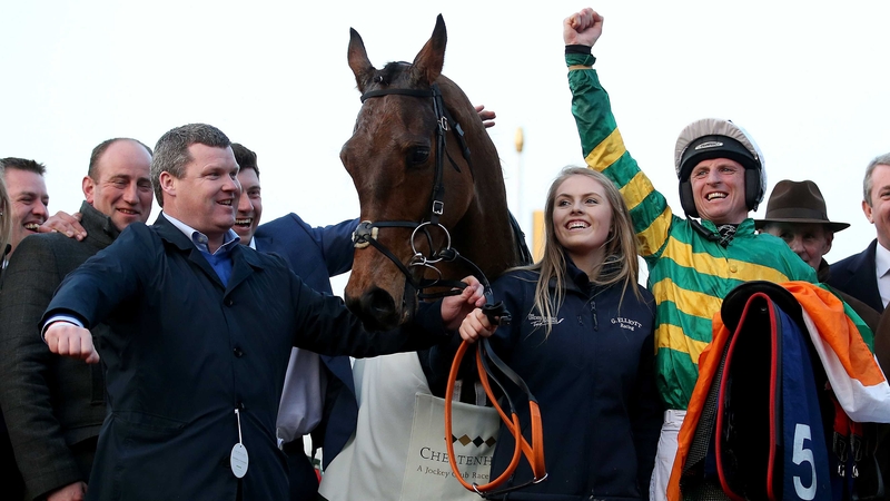 Jamie Codd celebrates winning at Cheltenham on Cause of Causes with trainer Gordon Elliott (L)