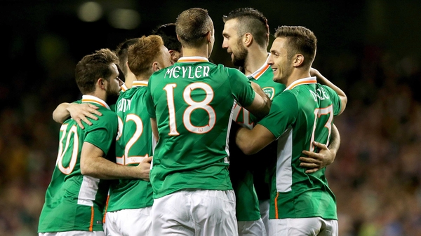 Ciaran Clarke is mobbed by his Ireland team mates after scoring what turned out to be the winning goal