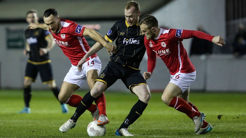 St Pat's Graham Kelly and David Cawley tangle with Chris Shields of Dundalk