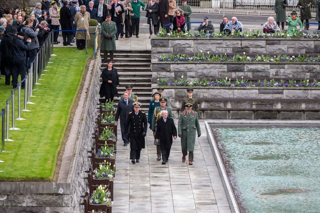 President Higgins makes his way to the Children of Lir sculpture in the Garden of Remembrance