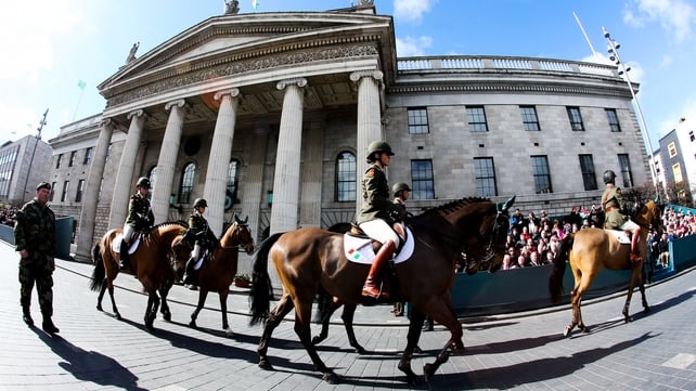 Mounted members of the Defence Forces parade past the GPO