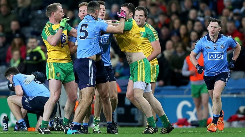 Dublin's James McCarthy clashes with Martin McElhinney of Donegal