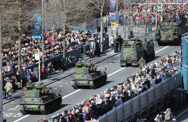 Armoured vehicles take part in the parade