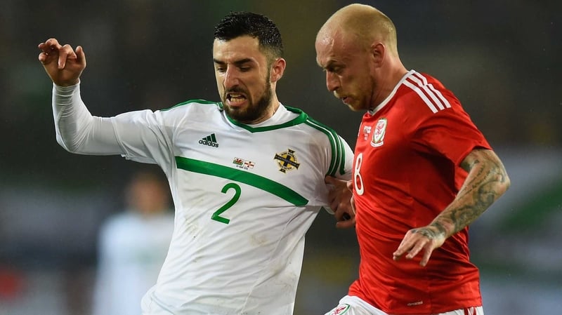 Conor McLaughlin (L) is challenged by David Cotterill