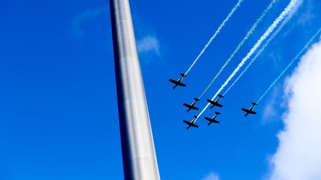 An Air Corps fly-past seen behind the Spire on O'Connell Street