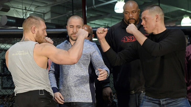 Conor McGregor and Nate Diaz after a news conference at UFC Gym in February