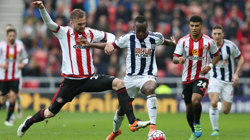 Saido Berahino of West Bromwich Albion is tackled by Sunderland's Jan Kirchhoff
