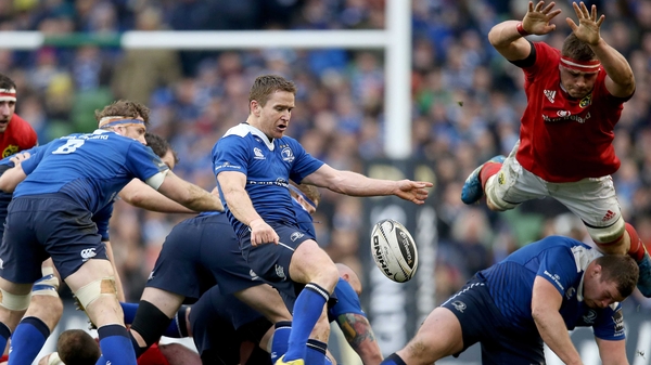 Leinster's Eoin Reddan and Jack McGrath try to evade a sprawling CJ Stander