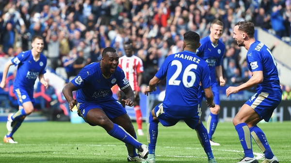 Wes Morgan celebrates his winning goal as the Foxes close in on the title