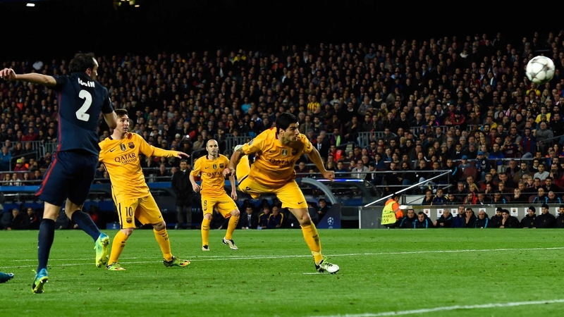 Luis Suarez heads in his and Barca's second goal