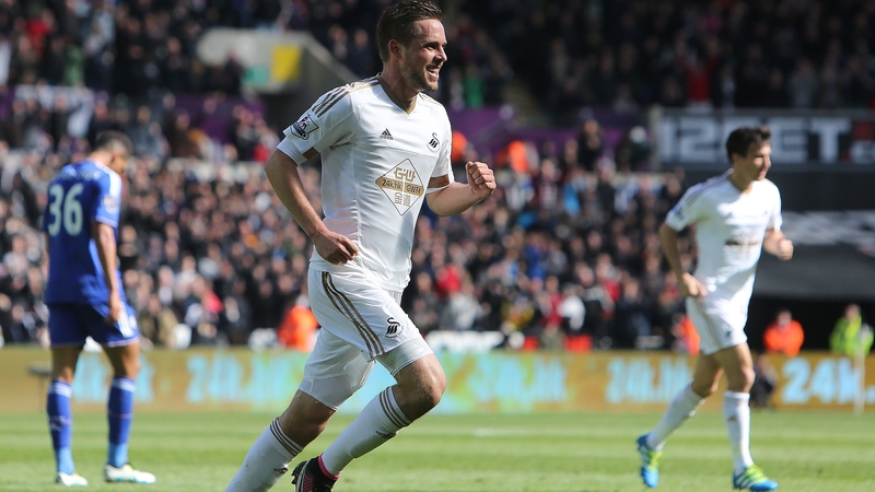 Swansea City's Gylfi Sigurdsson celebrates scoring against Chelsea