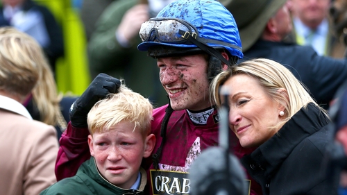 David Mullins celebrates with his mother and brother