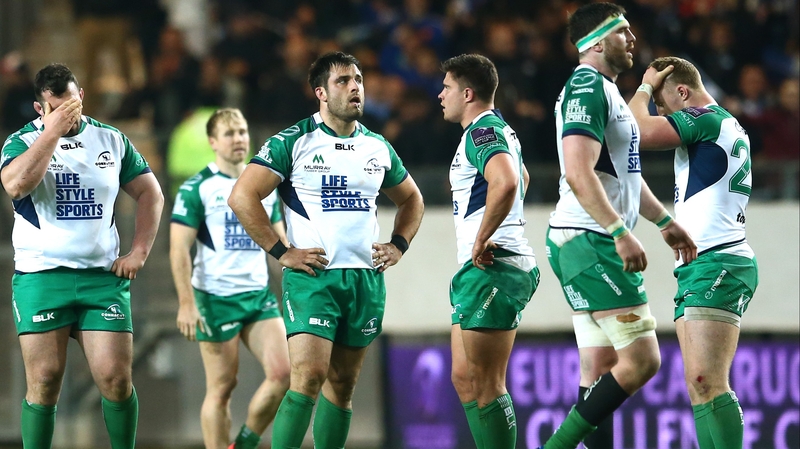 The Connacht team show their disappointment at the final whistle
