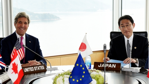 John Kerry and Japanese Foreign Minister Fumio Kishida pose during the first session of the G7 Foreign Ministers' meeting