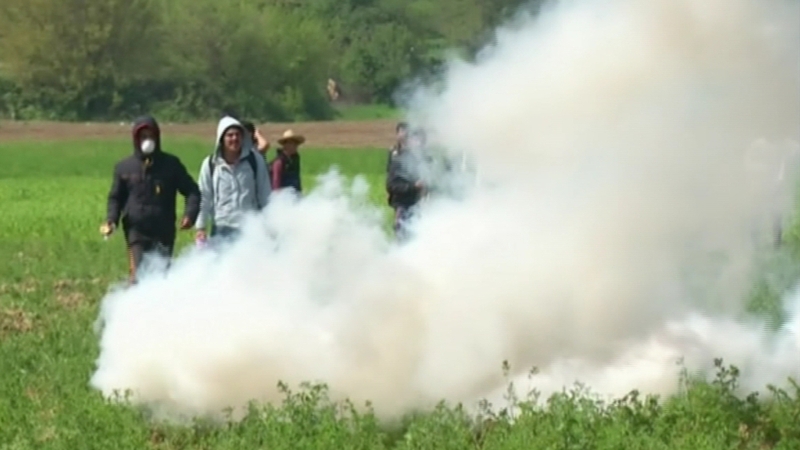 Tear gas was fired at a group of migrants and refugees close to the border fence