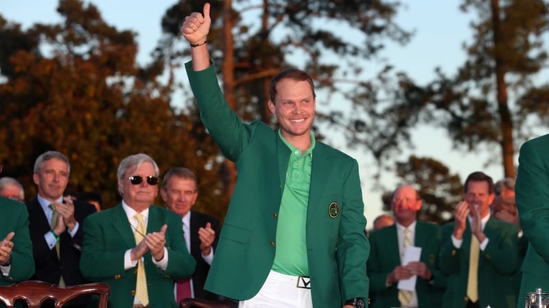 Danny Willett beams in the green jacket