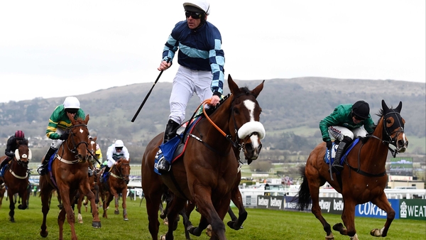 Davy Russell celebrates on board Diamond King after winning the the Coral Cup